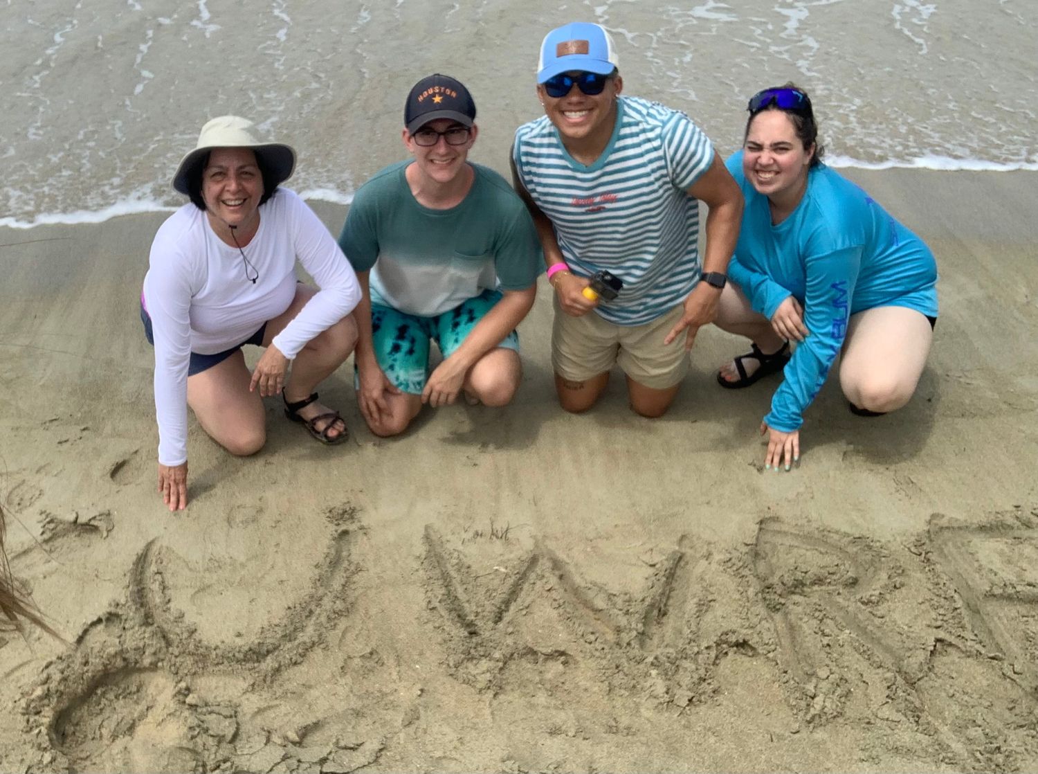 Faculty and students at beach in Puerto Rico