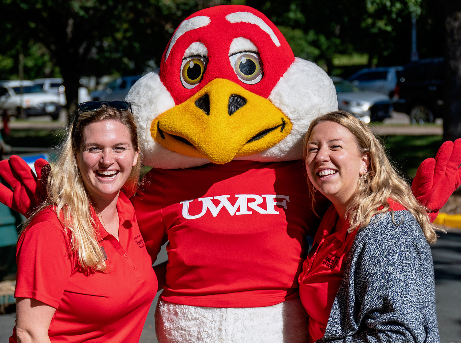 Photo of Freddy Falcon with residence life staff members