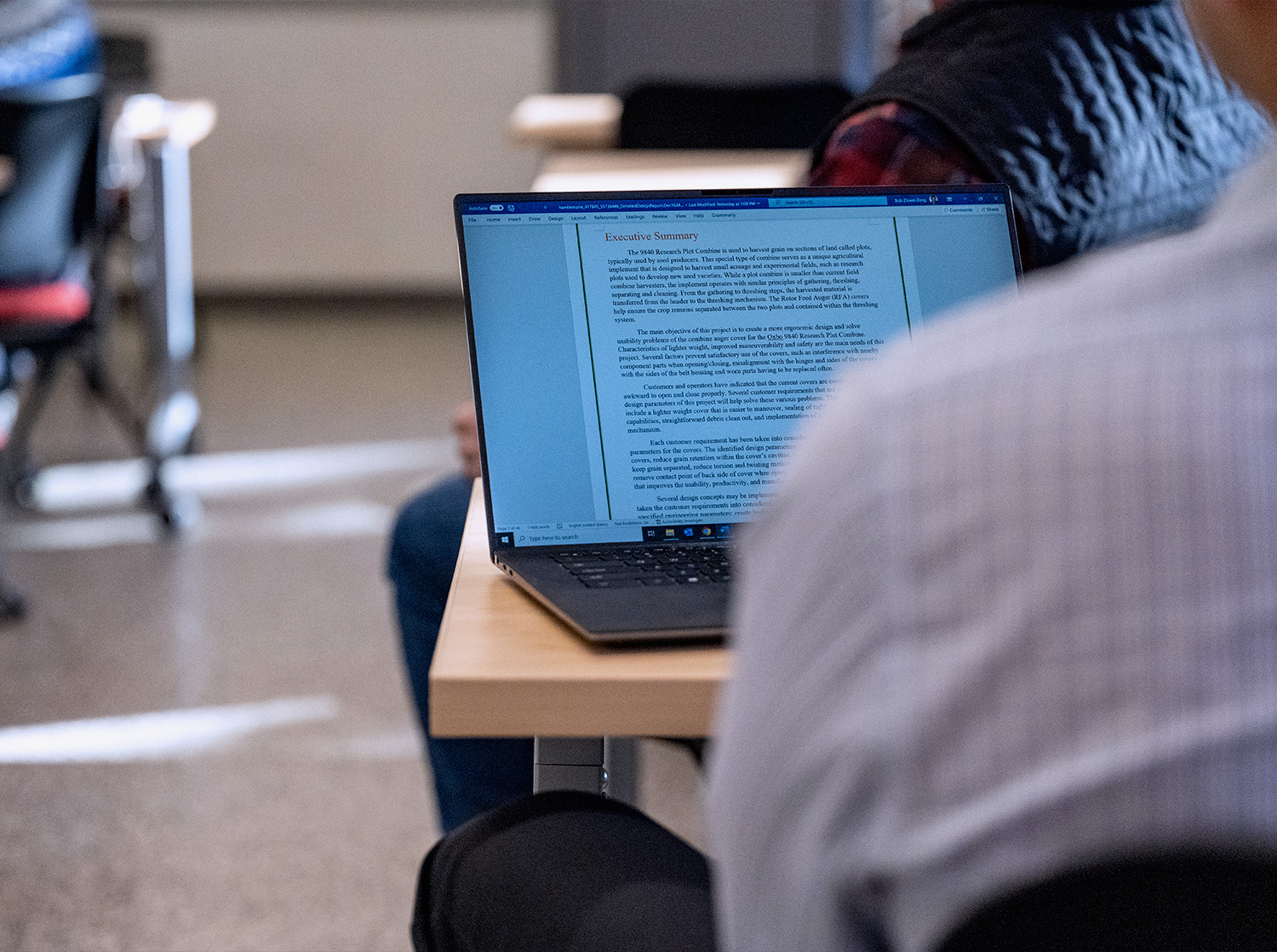 A student types on their laptop during class