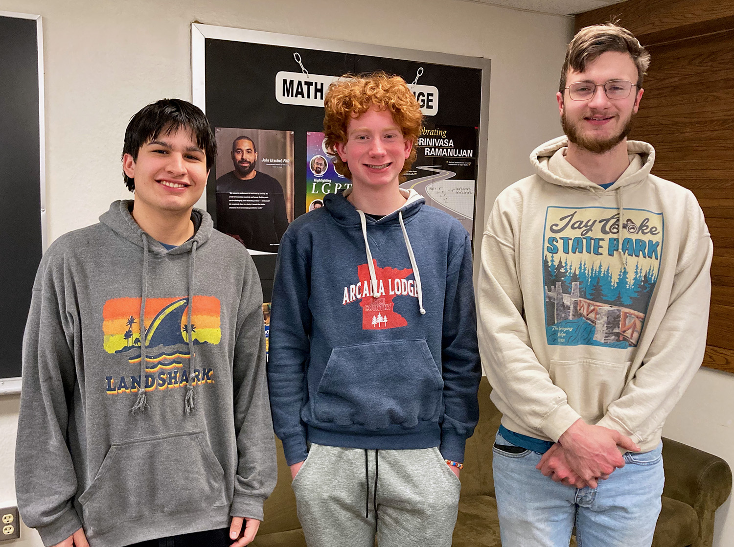 Marcos Martinez, Peter Bendel, and Nicholas Mohrhauser pose for a photo after presenting their Mathematical Contest in Modeling project