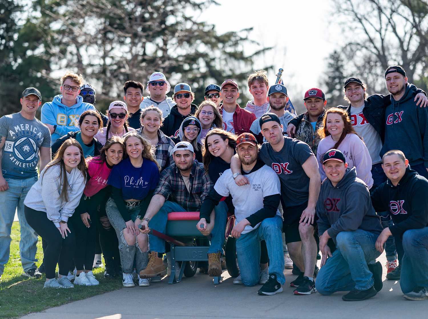 Group of Sorority and Fraternity members on the campus mall