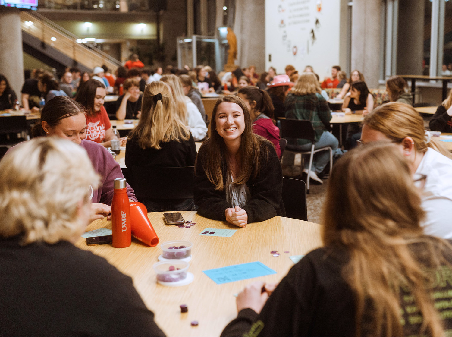 A group of students play bingo in the University Center