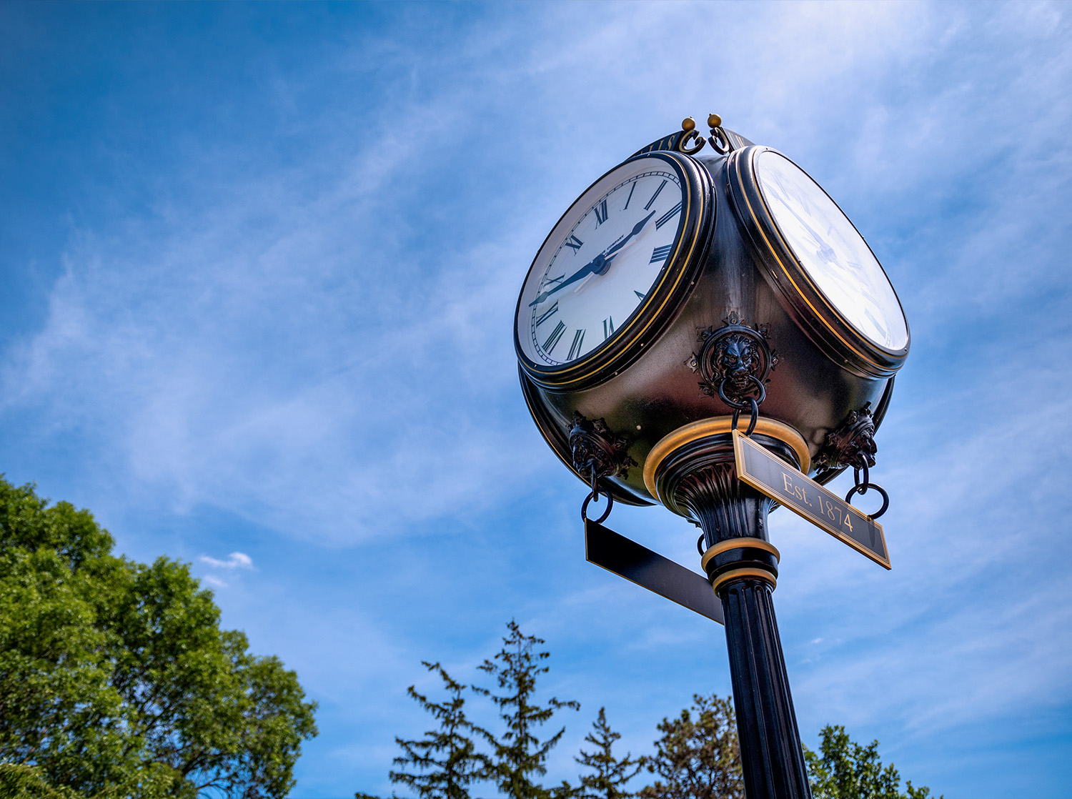 The campus clock on a summer day