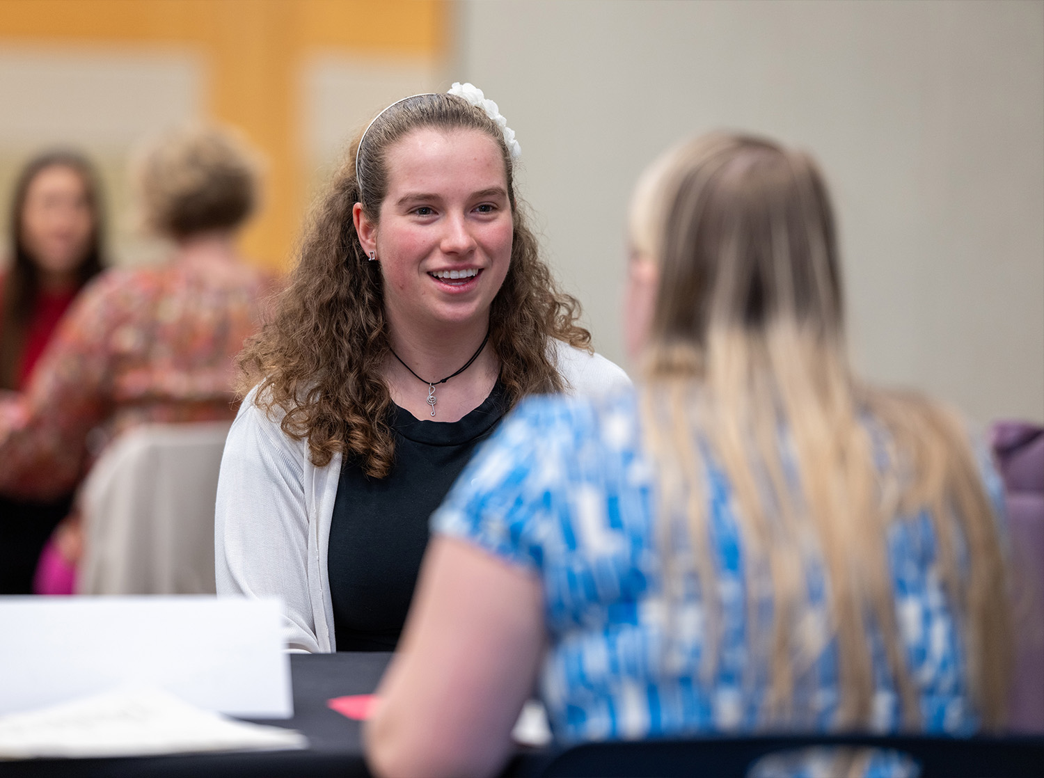 A female student sits in front of a staff member during a resume and interview workshop hosted by Career Services