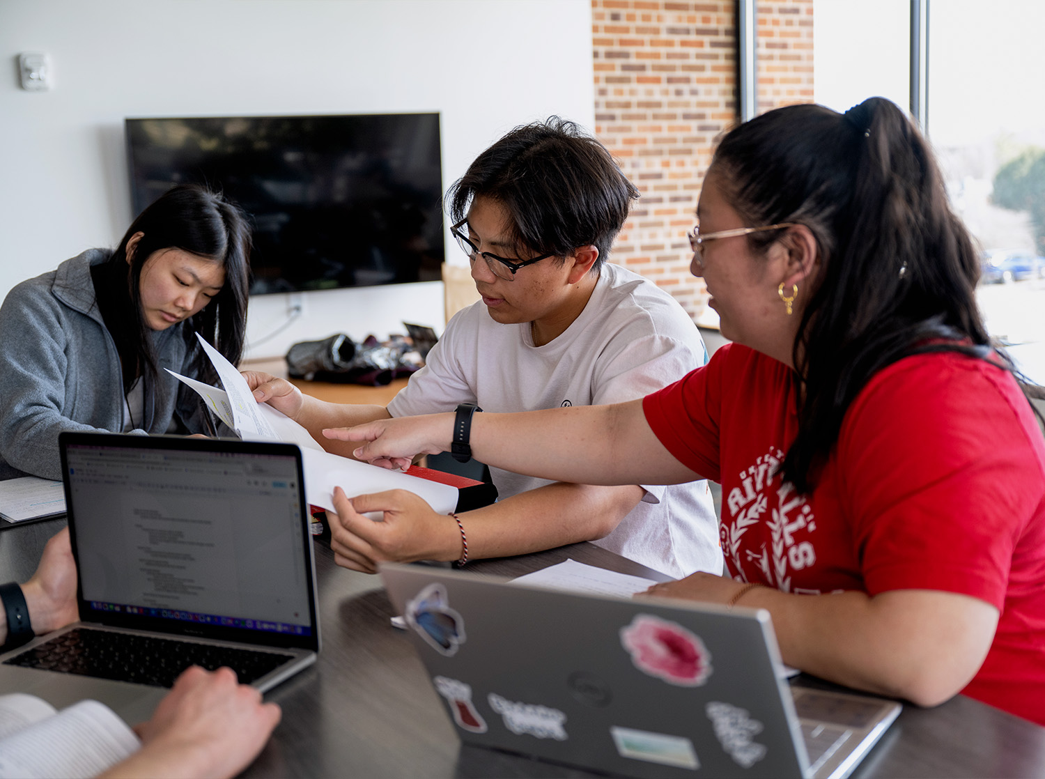 A group of students work on a class project together