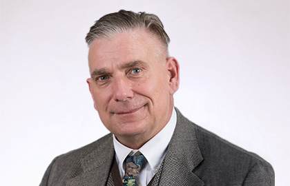 Headshot of Christopher Simer