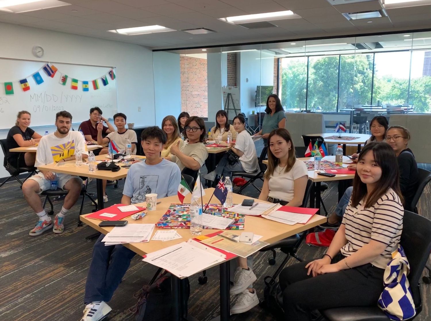 International students attending an orientation session together