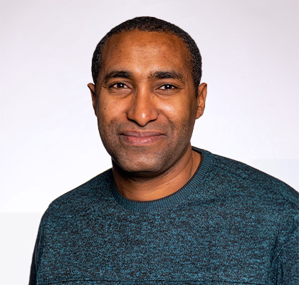 Headshot of Melaku Abegaz