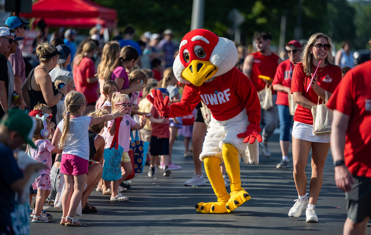 Freddy Falcon greets paradegoers