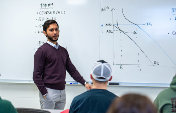 Professor Shaheer Burney teaches an agricultural economics class