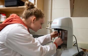 Student Researching in Biology Lab