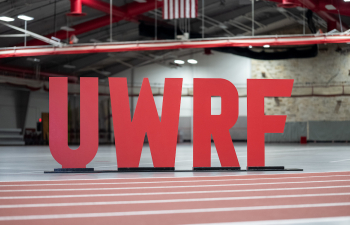 Tall red UWRF letters