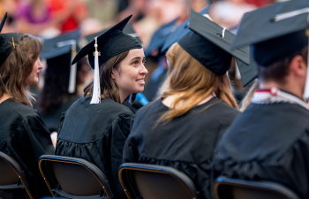 A group of students sit during the commencement ceremony