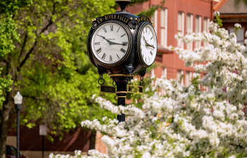 The university clock on a nice spring day