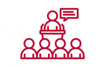 Icon of a person at a podium with an audience