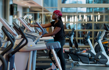 A student works out in the Fitness Center