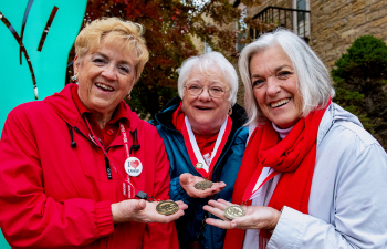 Three alumni attend the homecoming parade