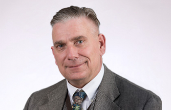 Headshot of Christopher Simer