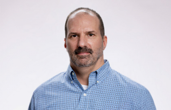 Headshot of Eric Loomis