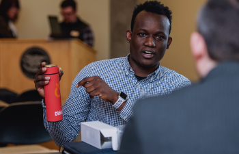 Lamah Bility pitches his water bottle design during the Innovation Challenge