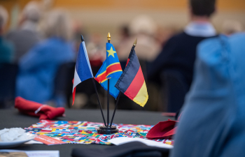 small international flags sit on a table display